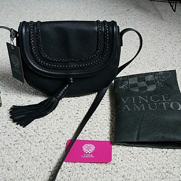 Vince Camuto Handbags - Vince Camuto black tassel cross body bag